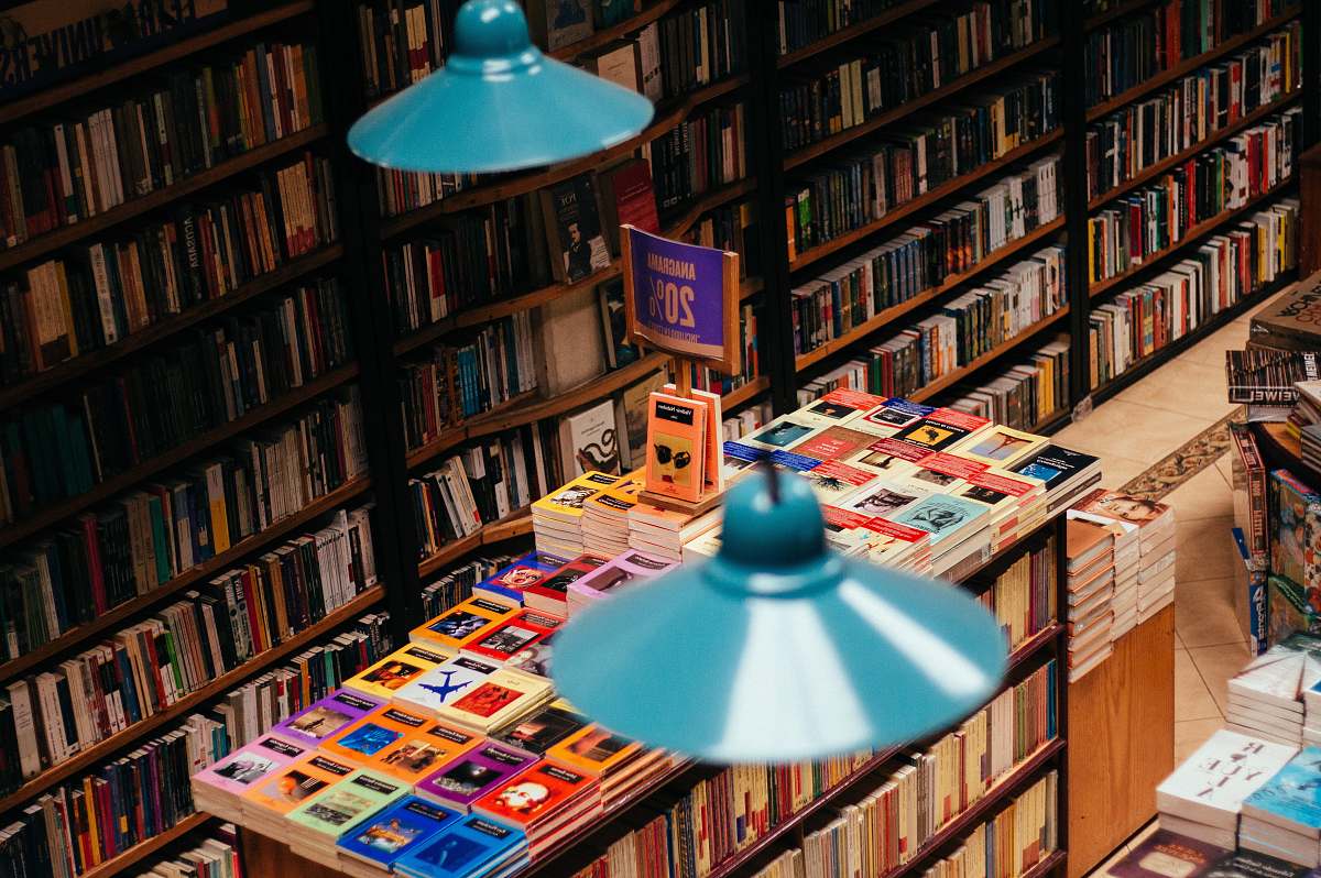 library person taking picture inside the library room